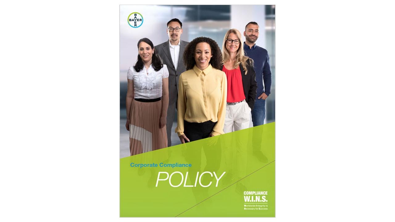 A diverse group of professionals stands together on the cover of a document titled "Corporate Compliance Policy" with a green and white design.