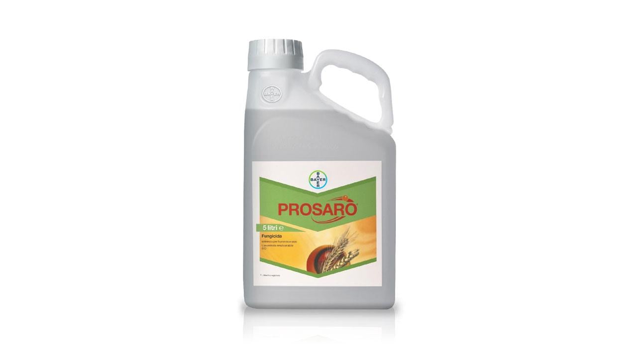 A plastic container of Prosaro fungicide with a green and beige label featuring a wheat graphic.