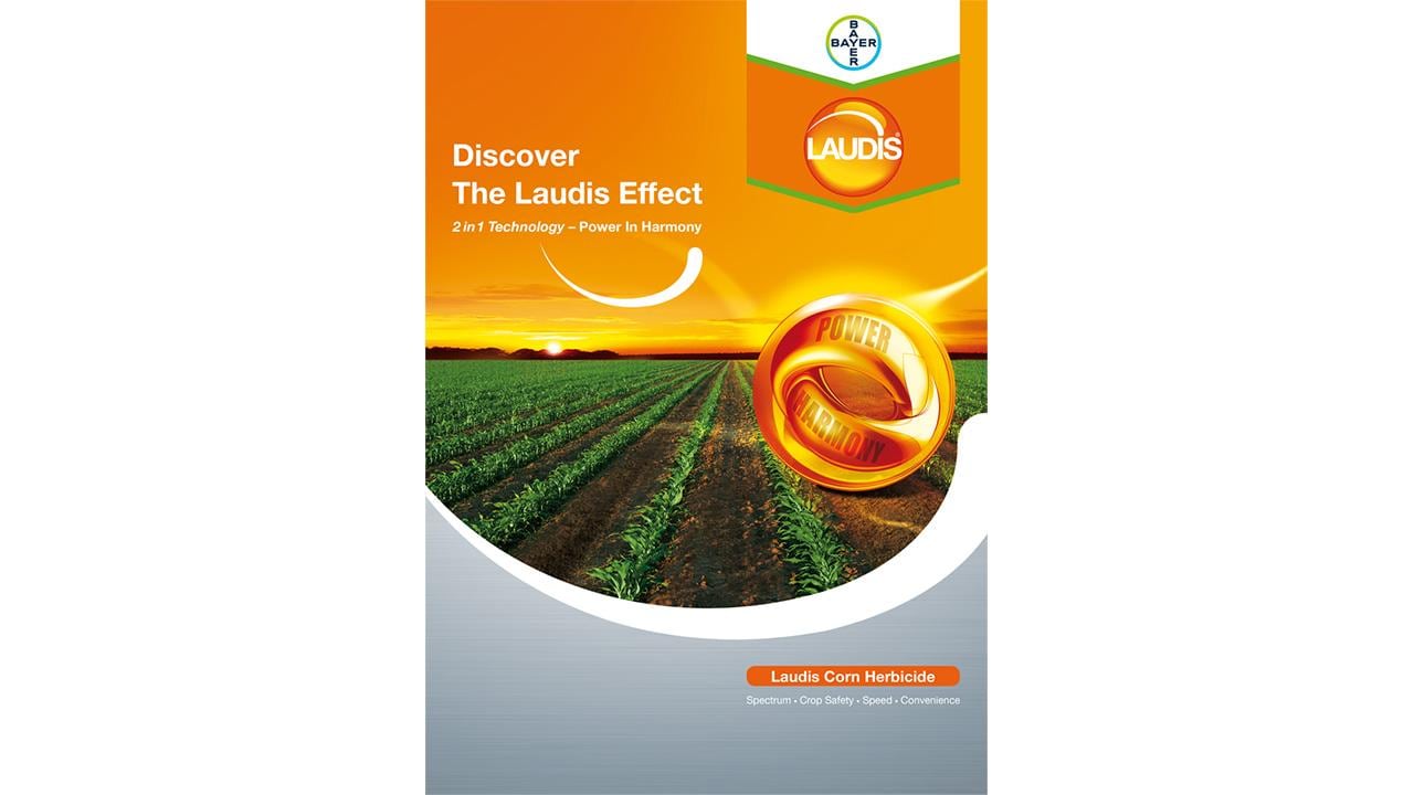 Advertisement for Laudis, a corn herbicide, highlighting "2 in 1 Technology - Power in Harmony" with an image of a cornfield at sunset.
