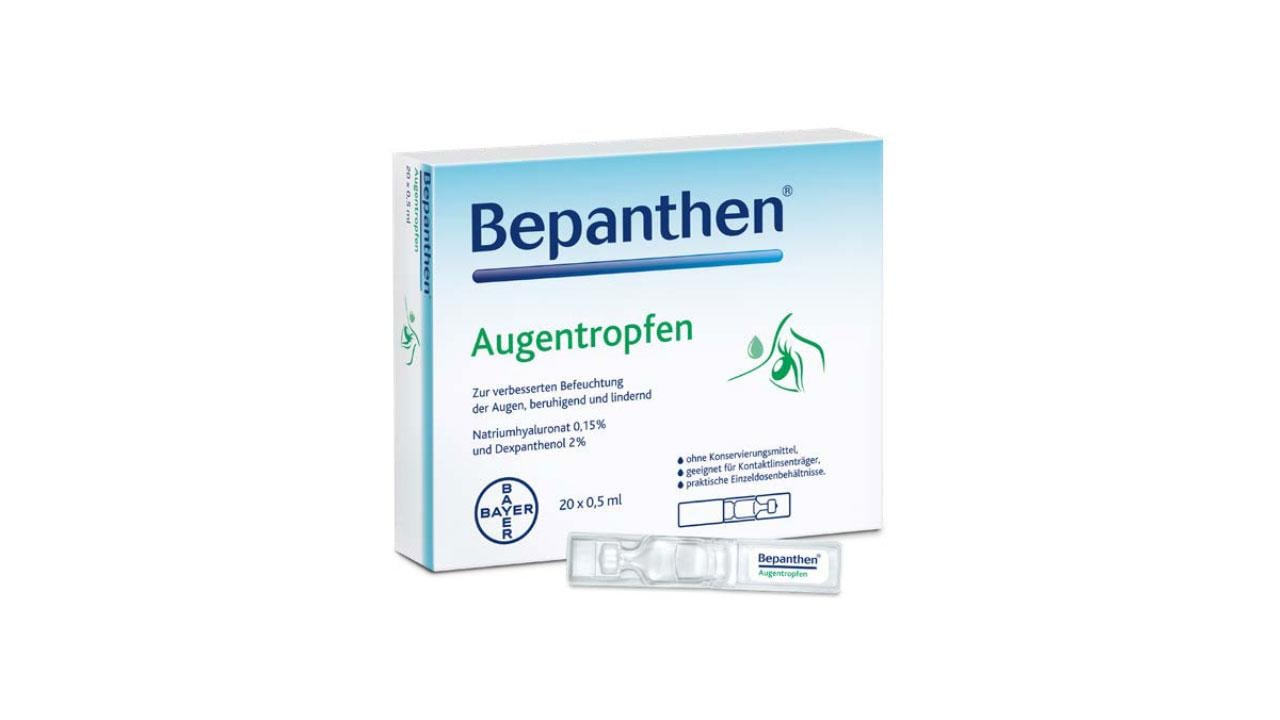 Box and single pack of Bepanthen eye drops, featuring the brand logo and text in German.