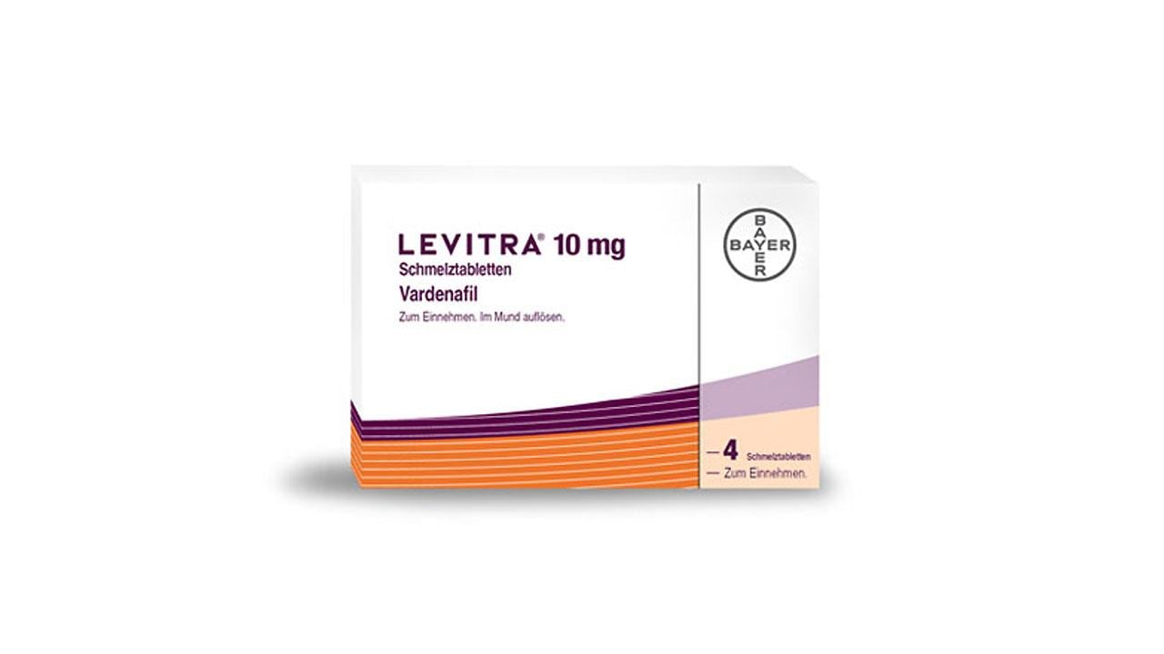 Image of a Levitra 10 mg medication box by Bayer, containing four dissolvable tablets of Vardenafil, used for oral administration.