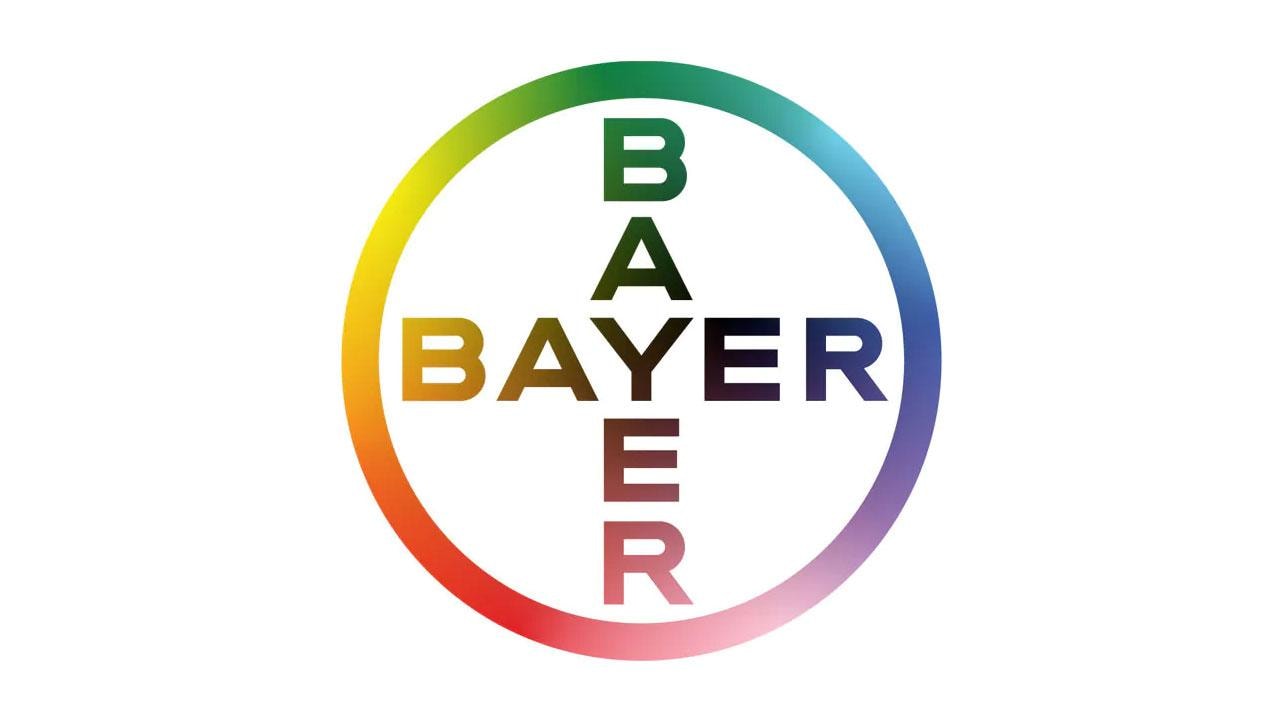 The Bayer logo features the company name in a circular arrangement with a rainbow gradient border.