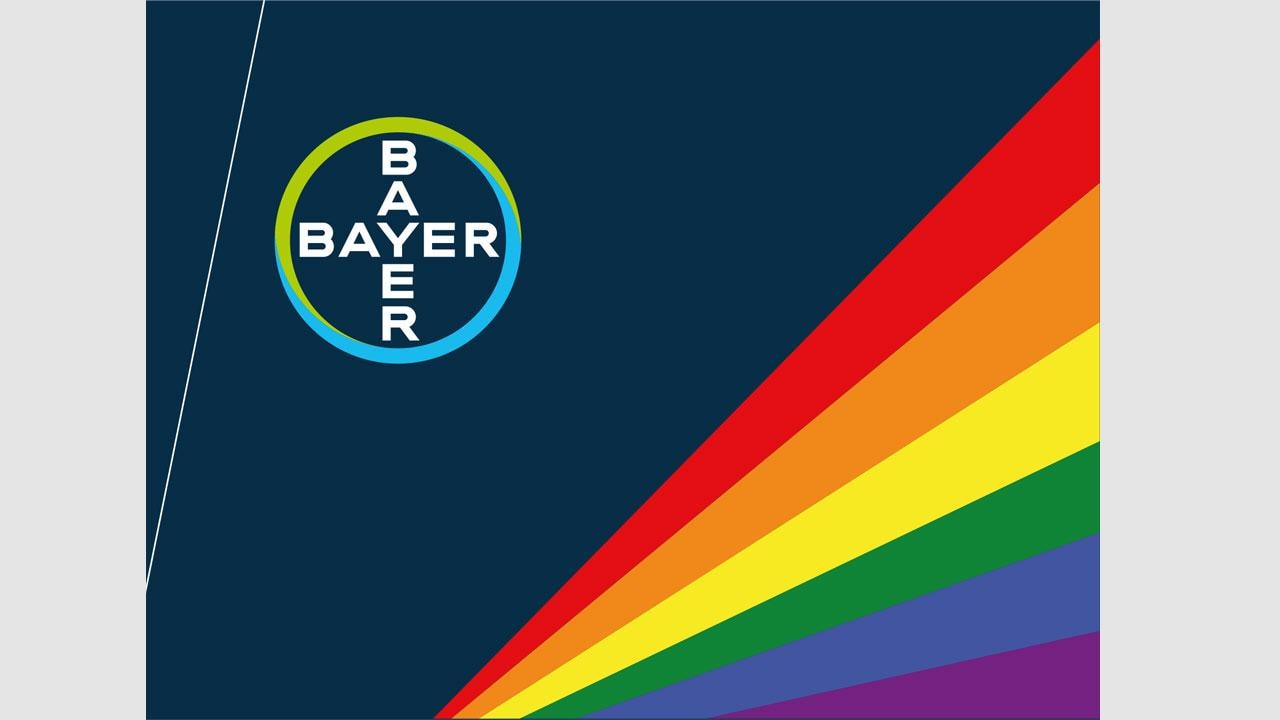 Bayer logo on a dark background with a diagonal rainbow stripe design on the right.
