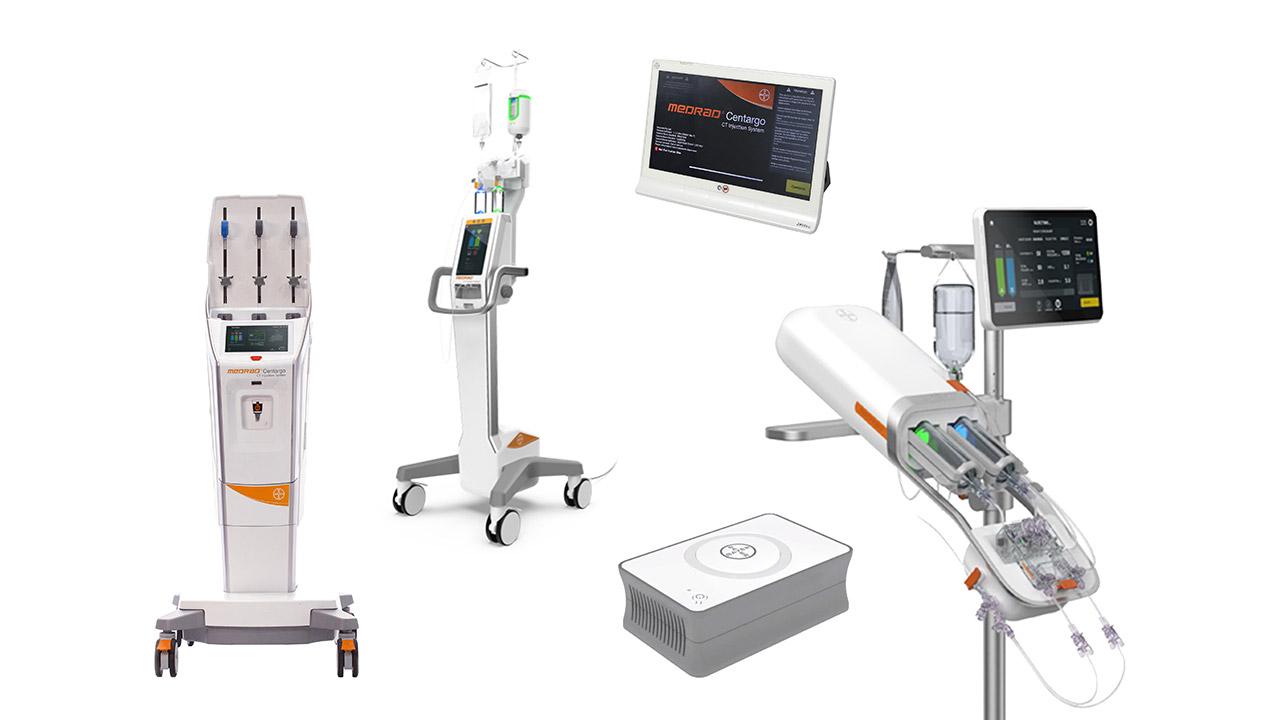 A collection of medical devices including infusion pumps, a touch screen monitor, and a medical control unit.