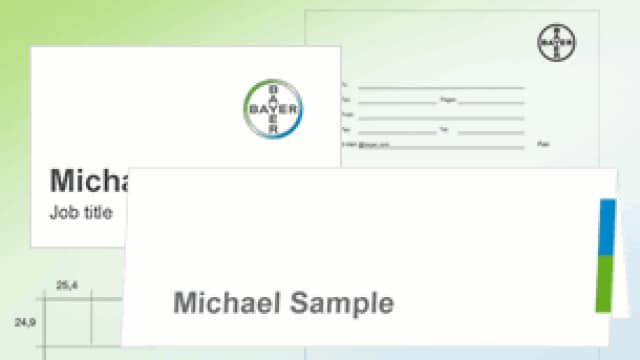 Three business cards with the name "Michael Sample," each featuring the Bayer logo, are shown on a gradient background.