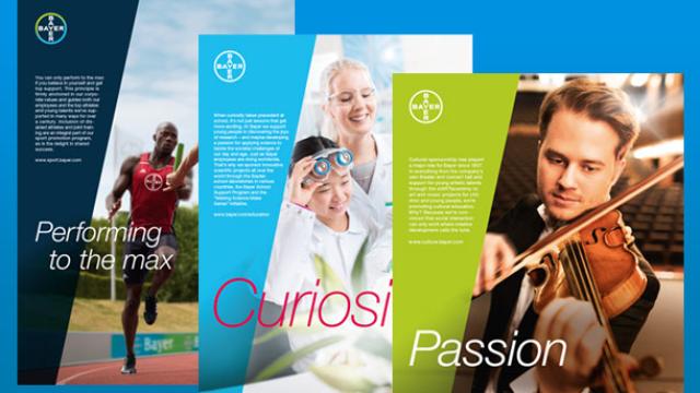 A collage of three Bayer posters featuring themes: "Performing to the max," "Curiosity," and "Passion," each with a person engaged in a related activity.