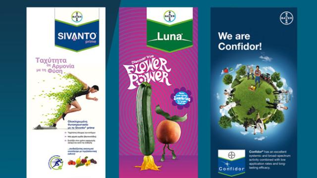 Three vertical banners display advertisements for products Sivanto prime, Luna, and Confidor by Bayer, featuring vibrant graphics and text in Greek and English.