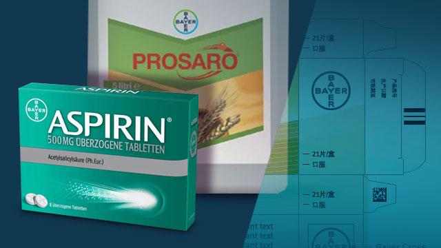 Boxes of Bayer products, including Aspirin and Prosaro, are displayed.