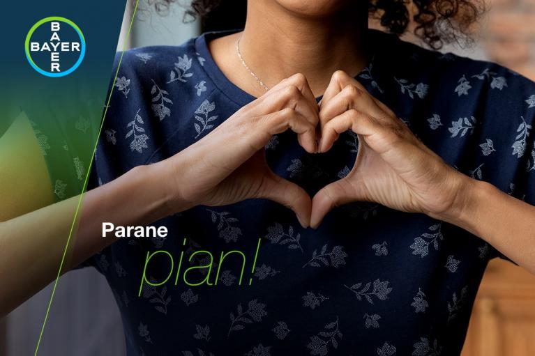 A person forms a heart shape with their hands on a patterned shirt. The Bayer logo is in the top left corner, and the text reads "Parane Pian!.