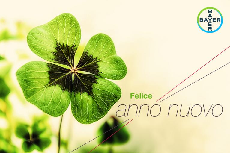 Image of a four-leaf clover with the words "Felice anno nuovo" and the Bayer logo in the corner.