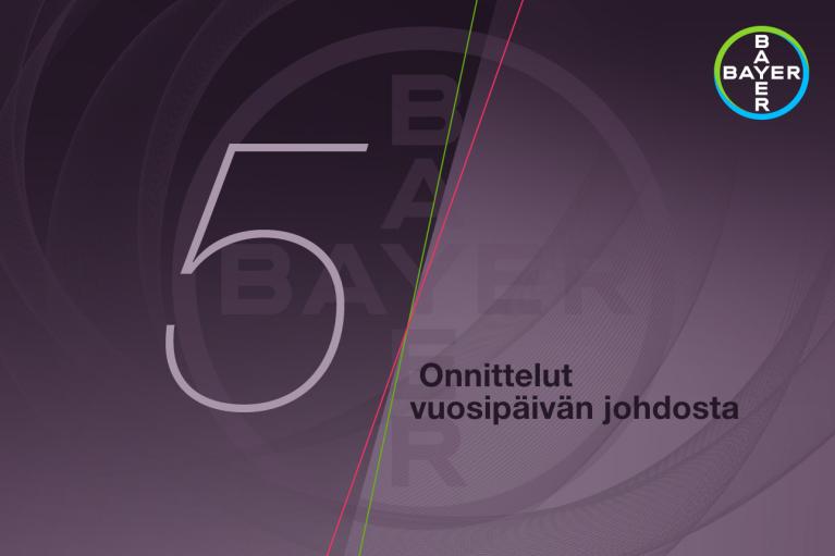 Bayer logo in the top right corner. Large number "5" and Finnish text "Onnittelut vuosipäivän johdosta" on a purple background with subtle circular patterns.