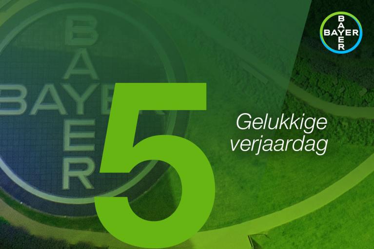 Green background with a large number 5, the word "BAYER" in a circular design, and the text "Gelukkige verjaardag.