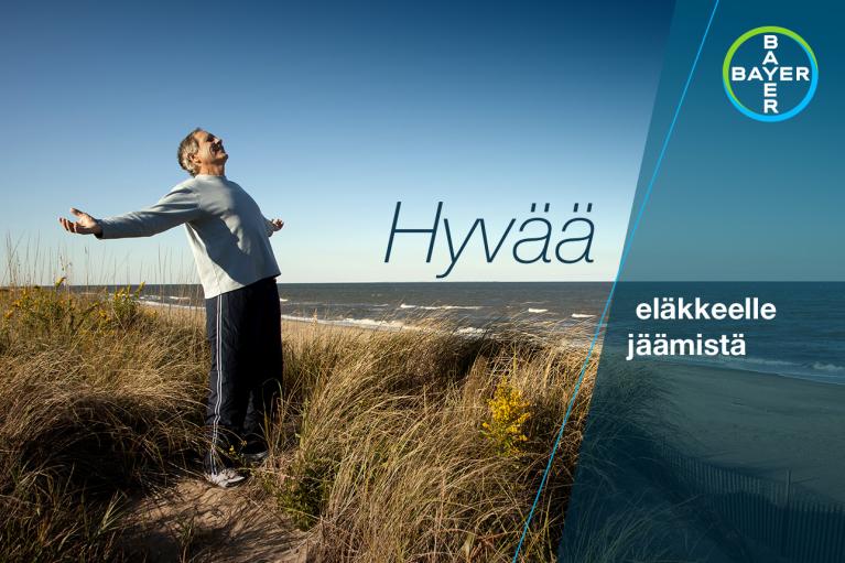 A person stands on a dune, arms outstretched, facing the ocean under a blue sky. Finnish text reads "Hyvää eläkkeelle jäämistä," with a Bayer logo in the top right corner.