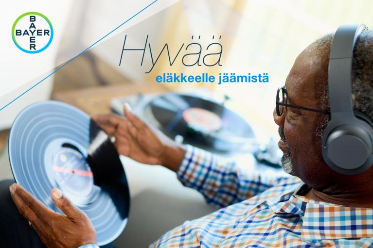 An elderly man with headphones holds a vinyl record. A Bayer logo is in the corner with Finnish text "Hyvää eläkkeelle jäämistä" (Happy Retirement) overlaid.