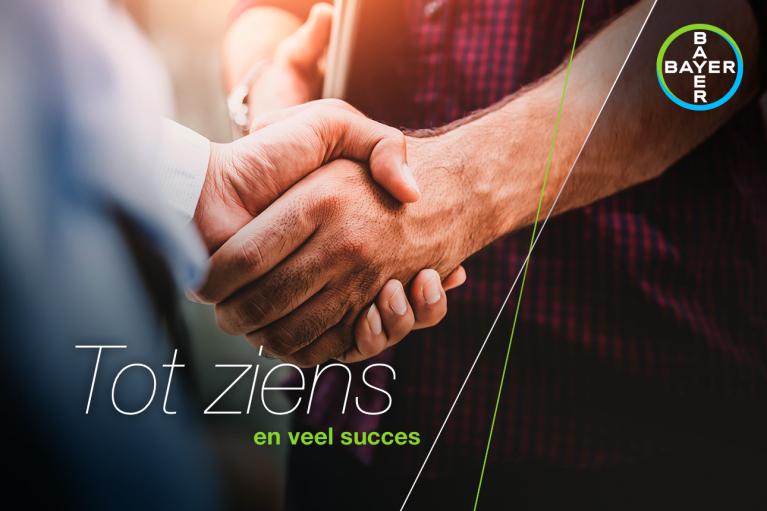 Two people shaking hands with the words "Tot ziens en veel succes" and the Bayer logo in the corner.