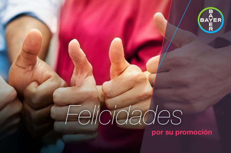 Group of people giving thumbs up with "Felicidades por su promoción" text on the image. Bayer logo is visible in the top right corner.