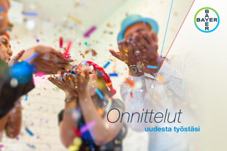 People celebrating with confetti, Bayer logo in the corner. Finnish text reads, "Congratulations on your new job.