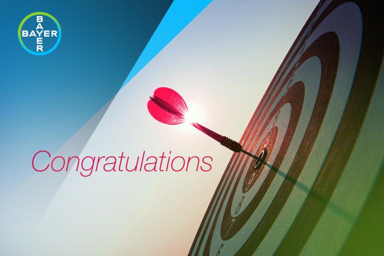 Target with a dart in the center and the word "Congratulations"