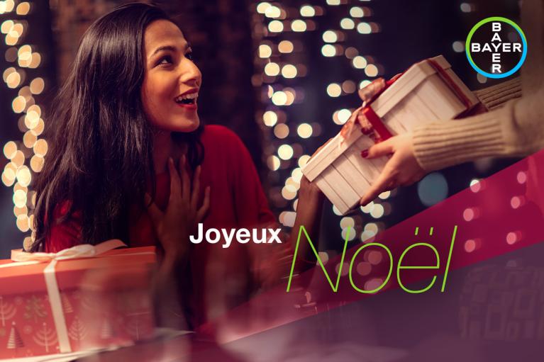 Joyeux Noël, woman gets Christmas gifts