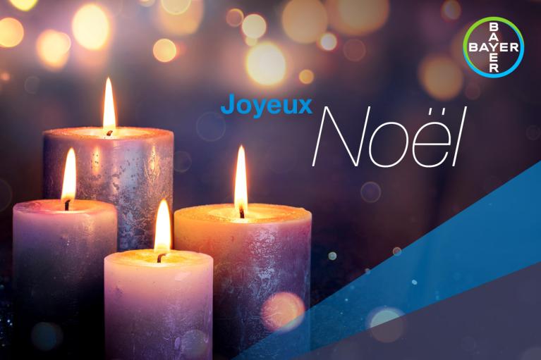 Joyeux Noël, 4 glowing candles