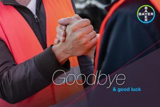 Two people wearing orange safety vests are shaking hands. The text reads, "Goodbye & good luck" with the Bayer logo at the top right corner.