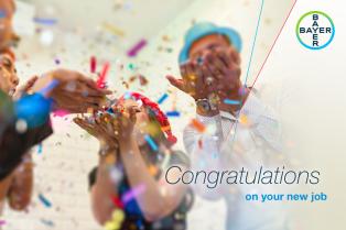 Group of people celebrating with confetti, with a "Congratulations on your new job" message and Bayer logo in the corner.